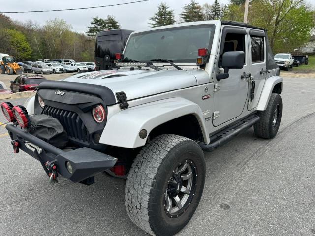 2010 Jeep Wrangler Unlimited Sahara VIN: 1J4HA5H13AL102980 Lot: 53465004