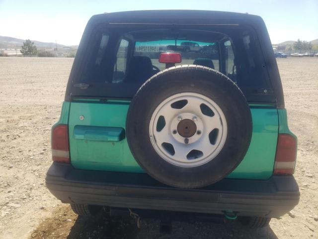 1994 Geo Tracker VIN: 2CNBJ18U6R6950284 Lot: 54611294