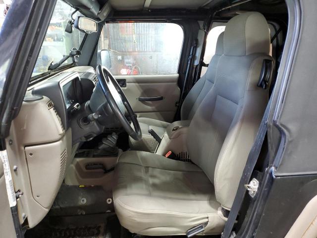 2004 Jeep Wrangler / Tj Sahara VIN: 1J4FA59S74P711954 Lot: 55703214