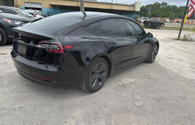 2021 Tesla Model 3 VIN: 5YJ3E1EA9MF048657 Lot: 55742584