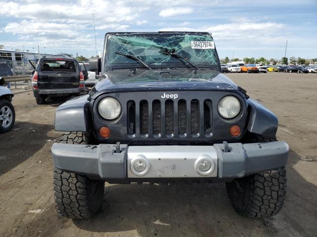 2011 Jeep Wrangler Unlimited Sahara VIN: 1J4HA5H10BL633605 Lot: 56437974