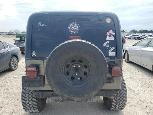 2000 Jeep Wrangler / Tj Sport VIN: 1J4FA49S8YP718475 Lot: 55375254