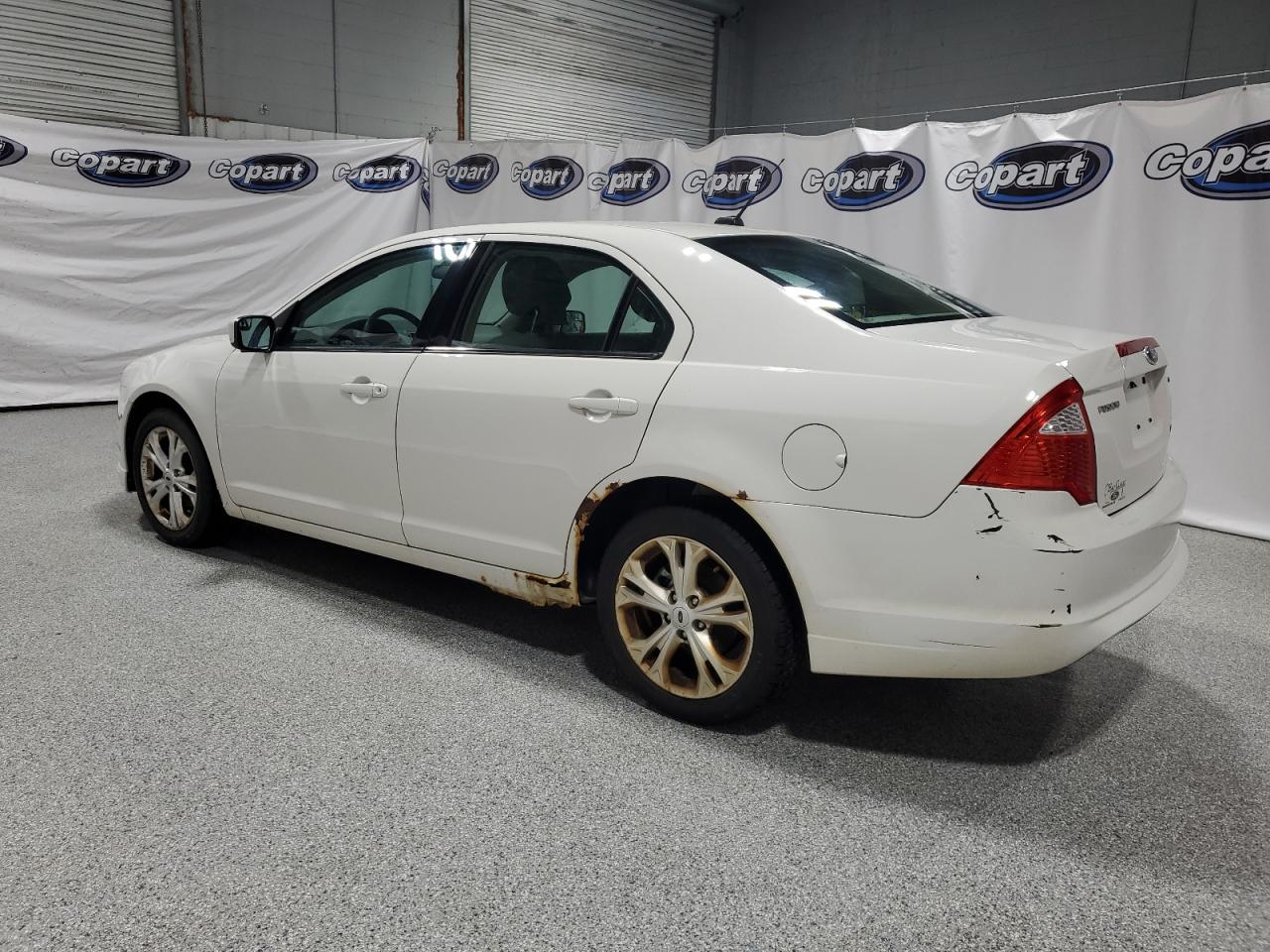 3FAHP0HA6CR297040 2012 Ford Fusion Se