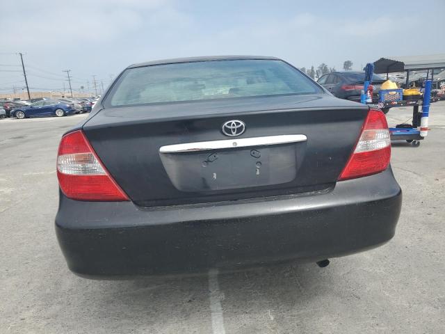 2002 Toyota Camry Le VIN: JTDBE32K320019347 Lot: 56772384