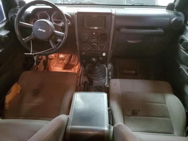 2007 Jeep Wrangler Sahara VIN: 1J8GA59197L105769 Lot: 55148174