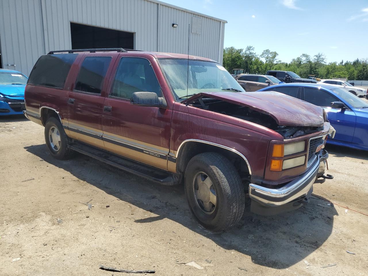 1GKFK16R9XJ800059 1999 GMC Suburban K1500