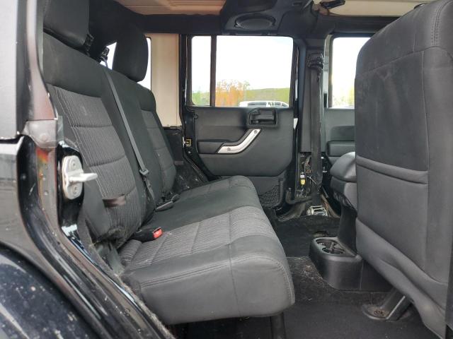 2011 Jeep Wrangler Unlimited Sahara VIN: 1J4HA5H13BL519095 Lot: 53950764