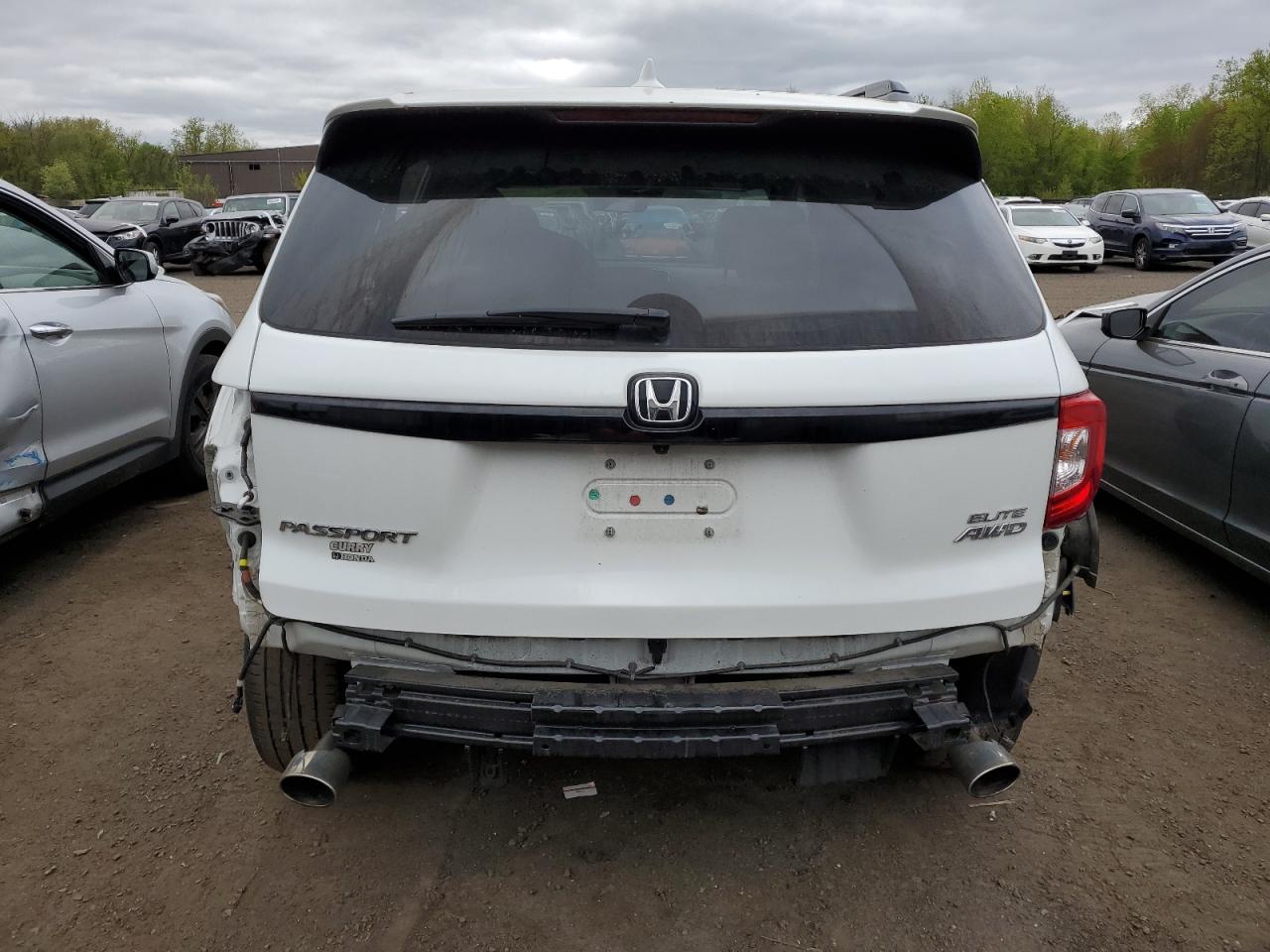 2021 Honda Passport Elite vin: 5FNYF8H07MB024291