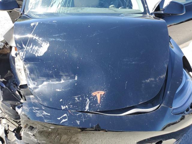 2023 Tesla Model Y VIN: 7SAYGDEE0PF692365 Lot: 61935314