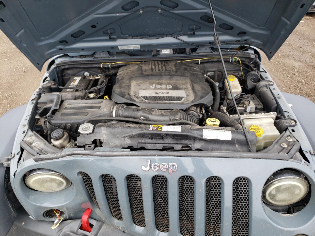 1C4BJWDG0EL277303 2014 Jeep Wrangler Unlimited Sport