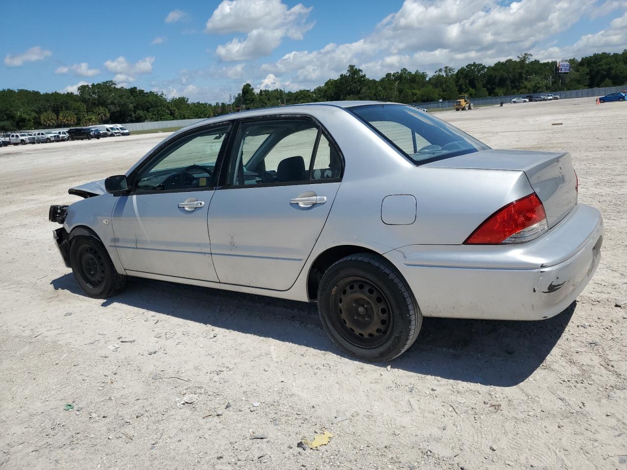 JA3AJ26EX2U027202 2002 Mitsubishi Lancer Es