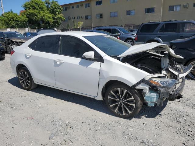 VIN 5YFBURHEXKP902634 2019 Toyota Corolla, L no.4