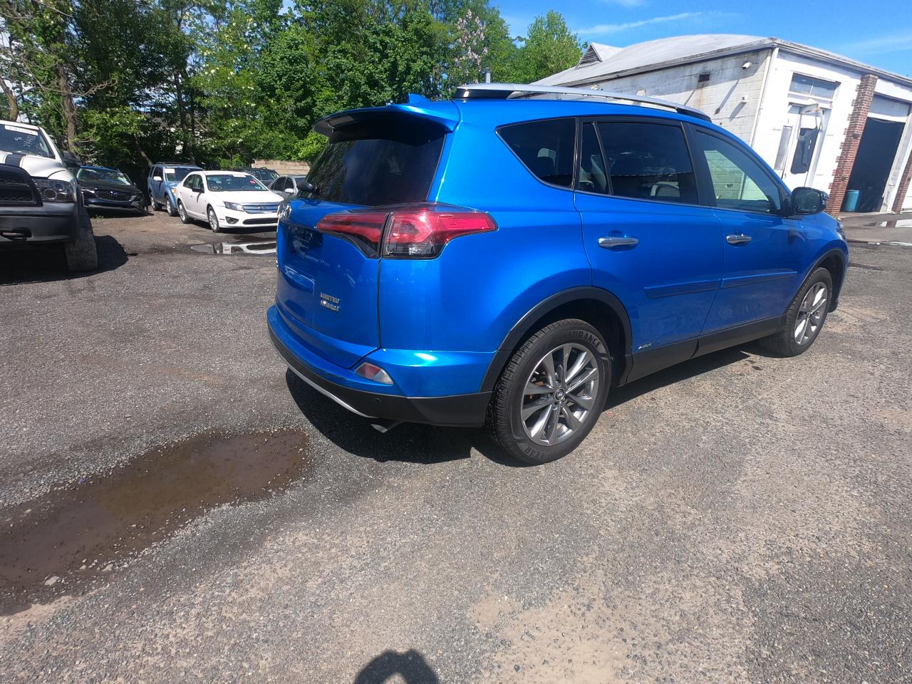 2016 Toyota Rav4 Hv Limited vin: JTMDJREVXGD017074