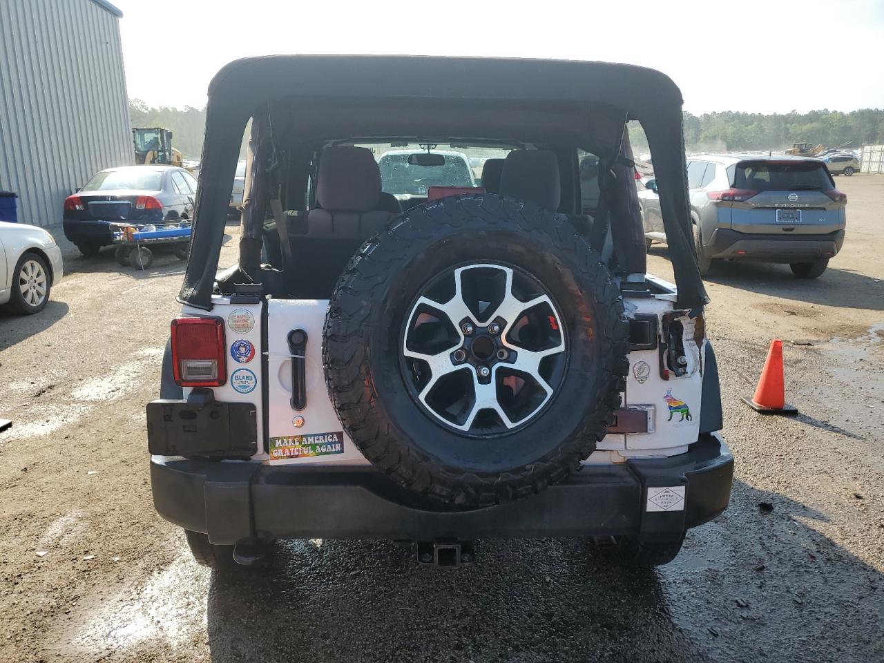 1C4BJWDG3DL660716 2013 Jeep Wrangler Unlimited Sport