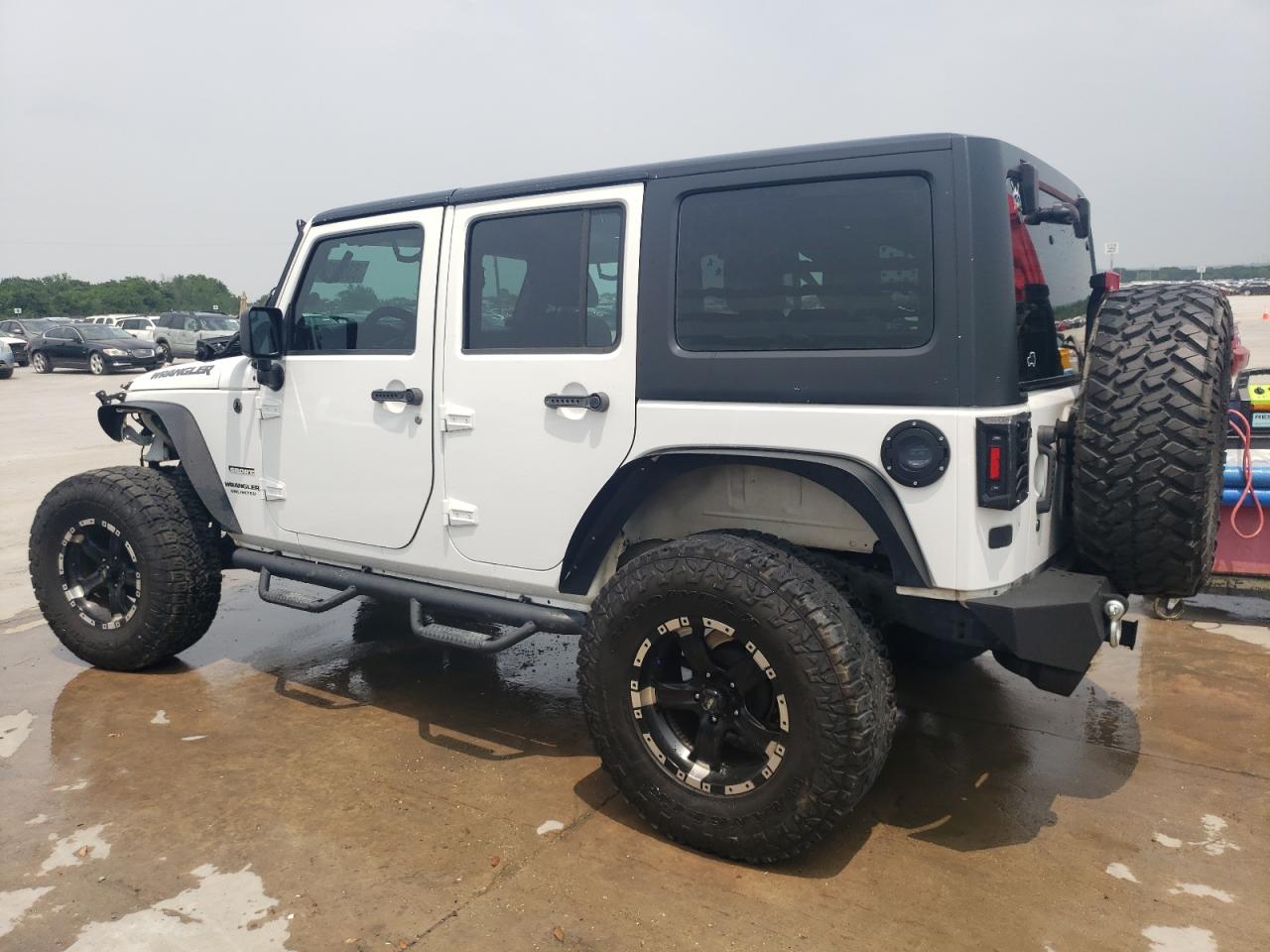 1C4BJWDG9DL632385 2013 Jeep Wrangler Unlimited Sport