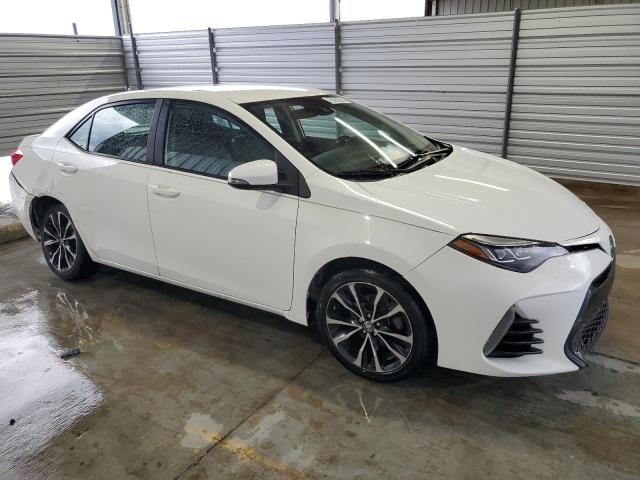 2019 Toyota Corolla L VIN: 2T1BURHE8KC131090 Lot: 56533424