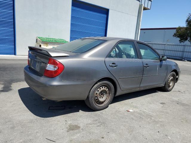 2002 Toyota Camry Le VIN: JTDBE32K920037951 Lot: 54976944