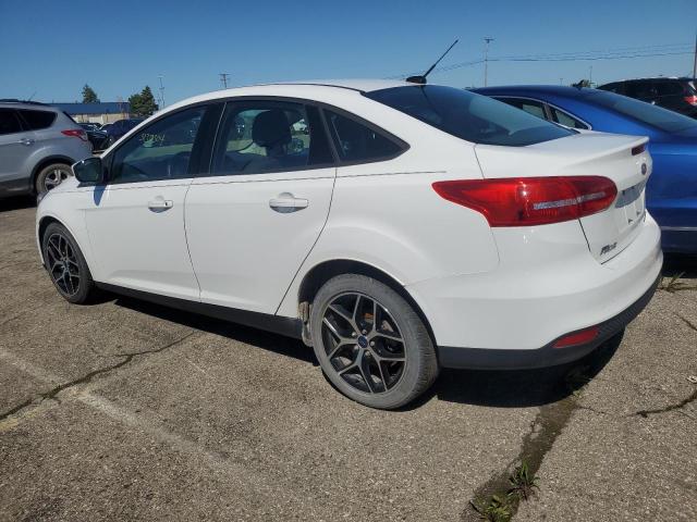 2018 Ford Focus Se VIN: 1FADP3FEXJL266892 Lot: 51359504