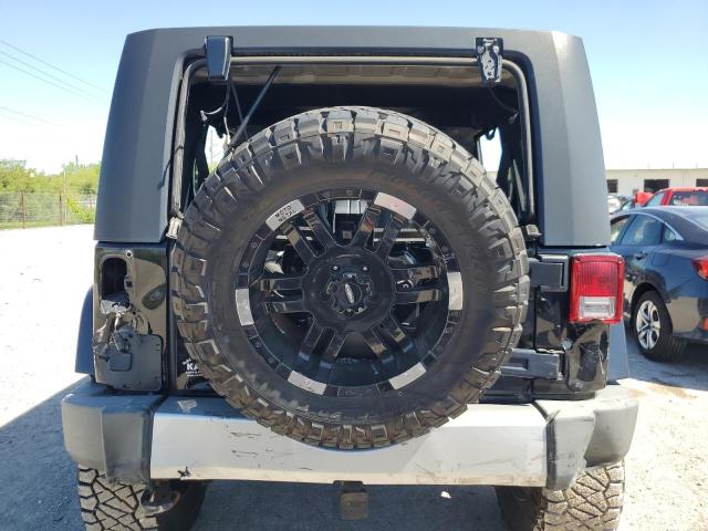 2009 Jeep Wrangler Unlimited Sahara VIN: 1J4GA591X9L770796 Lot: 56819804