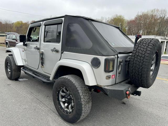 2010 Jeep Wrangler Unlimited Sahara VIN: 1J4HA5H13AL102980 Lot: 53465004