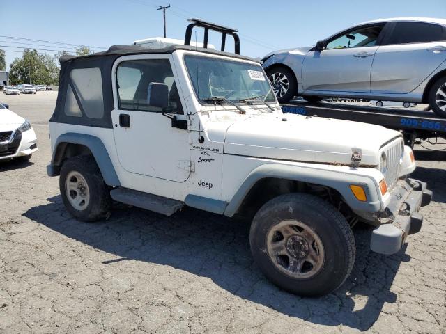 2000 Jeep Wrangler / Tj Sport VIN: 1J4FA49S9YP748861 Lot: 53635104