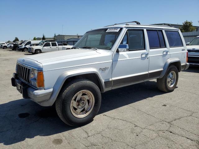 1992 Jeep Cherokee Laredo VIN: 1J4FJ58S8NL233201 Lot: 56463664