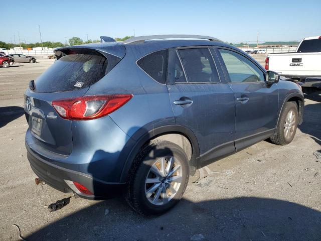 2014 Mazda Cx-5 Touring VIN: JM3KE2CYXE0396699 Lot: 53294774