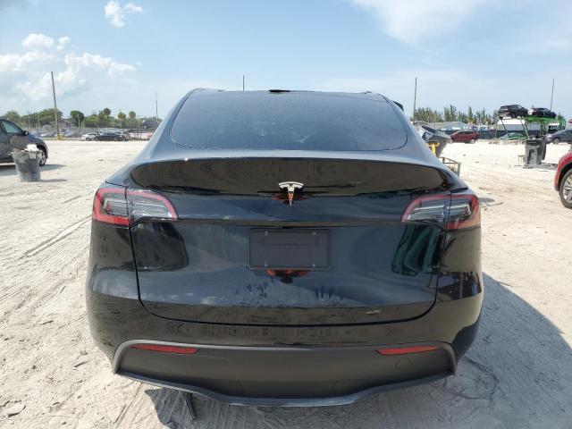 2023 Tesla Model Y VIN: 7SAYGDEDXPF949863 Lot: 55997194