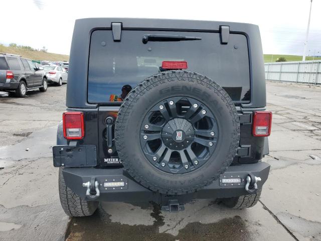 2011 Jeep Wrangler Unlimited Sahara VIN: 1J4HA5H13BL519095 Lot: 53950764