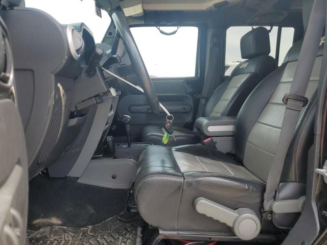 2009 Jeep Wrangler Unlimited Sahara VIN: 1J4GA59179L751686 Lot: 57171124