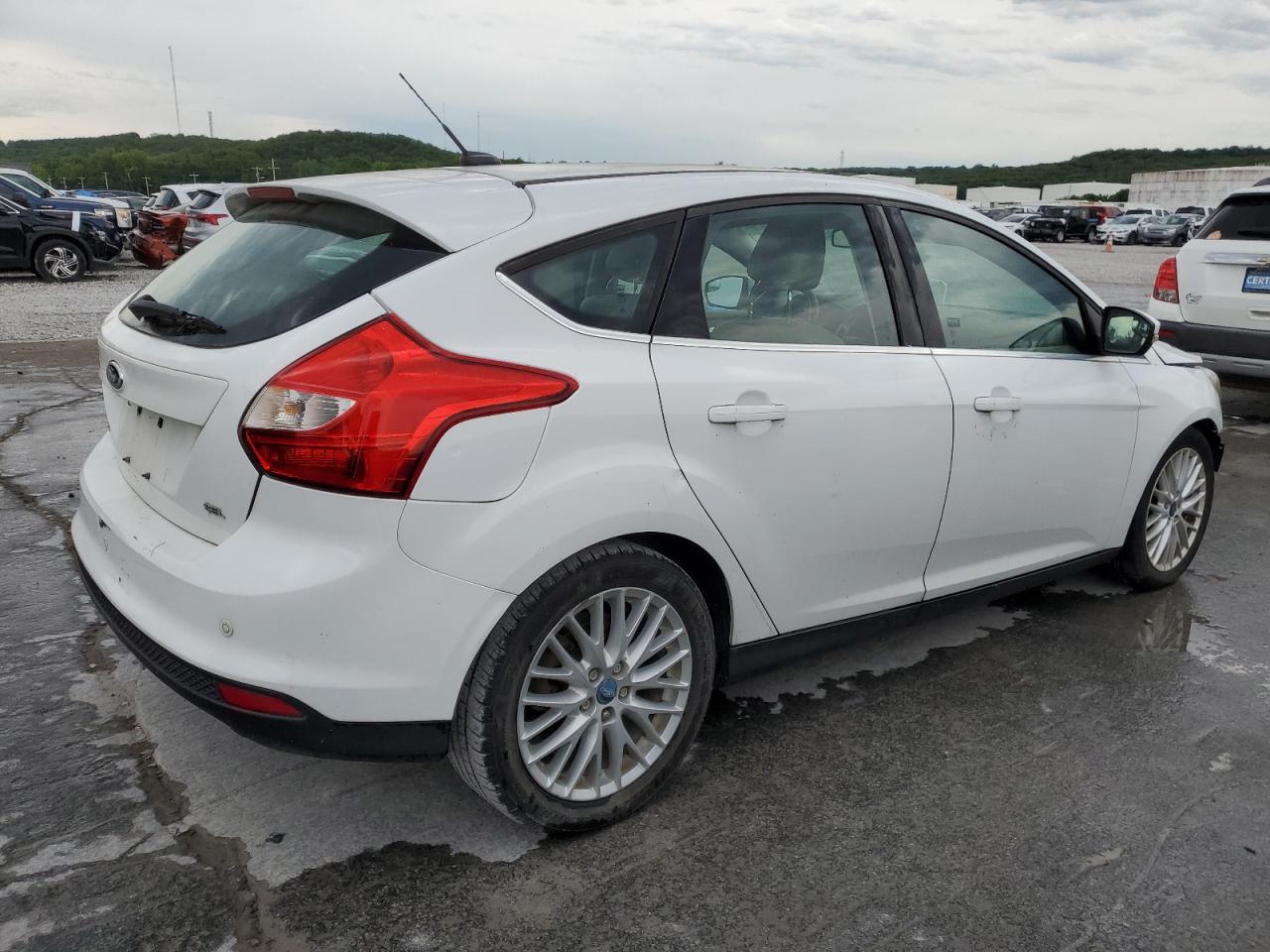 1FAHP3M2XCL154154 2012 Ford Focus Sel