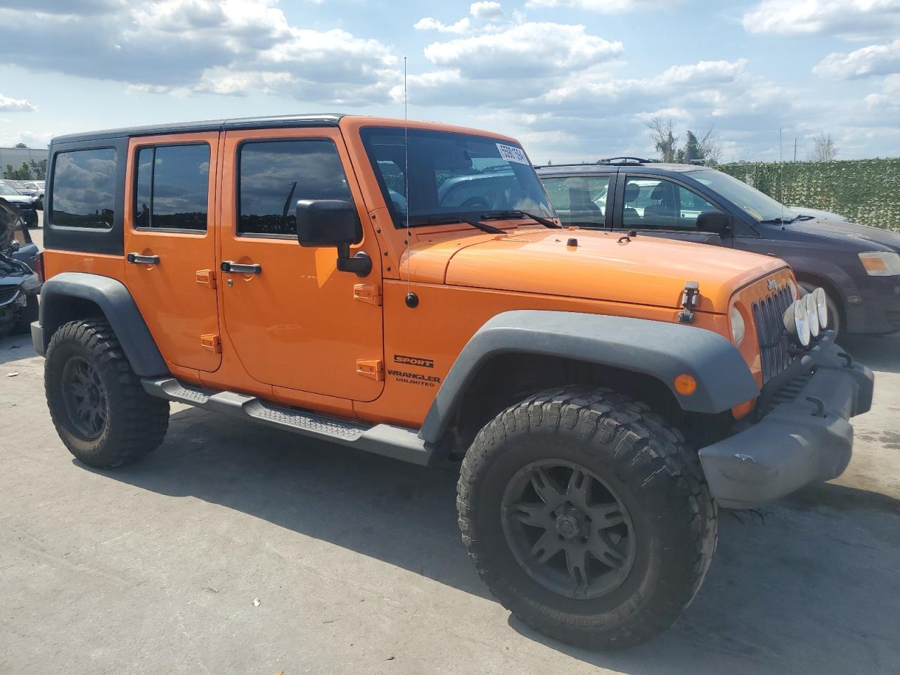 1C4BJWDG6DL565566 2013 Jeep Wrangler Unlimited Sport