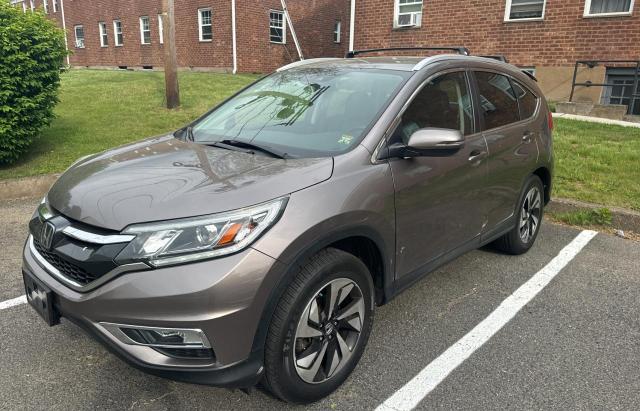 2015 Honda Cr-V Touring VIN: 5J6RM4H9XFL128236 Lot: 56380904