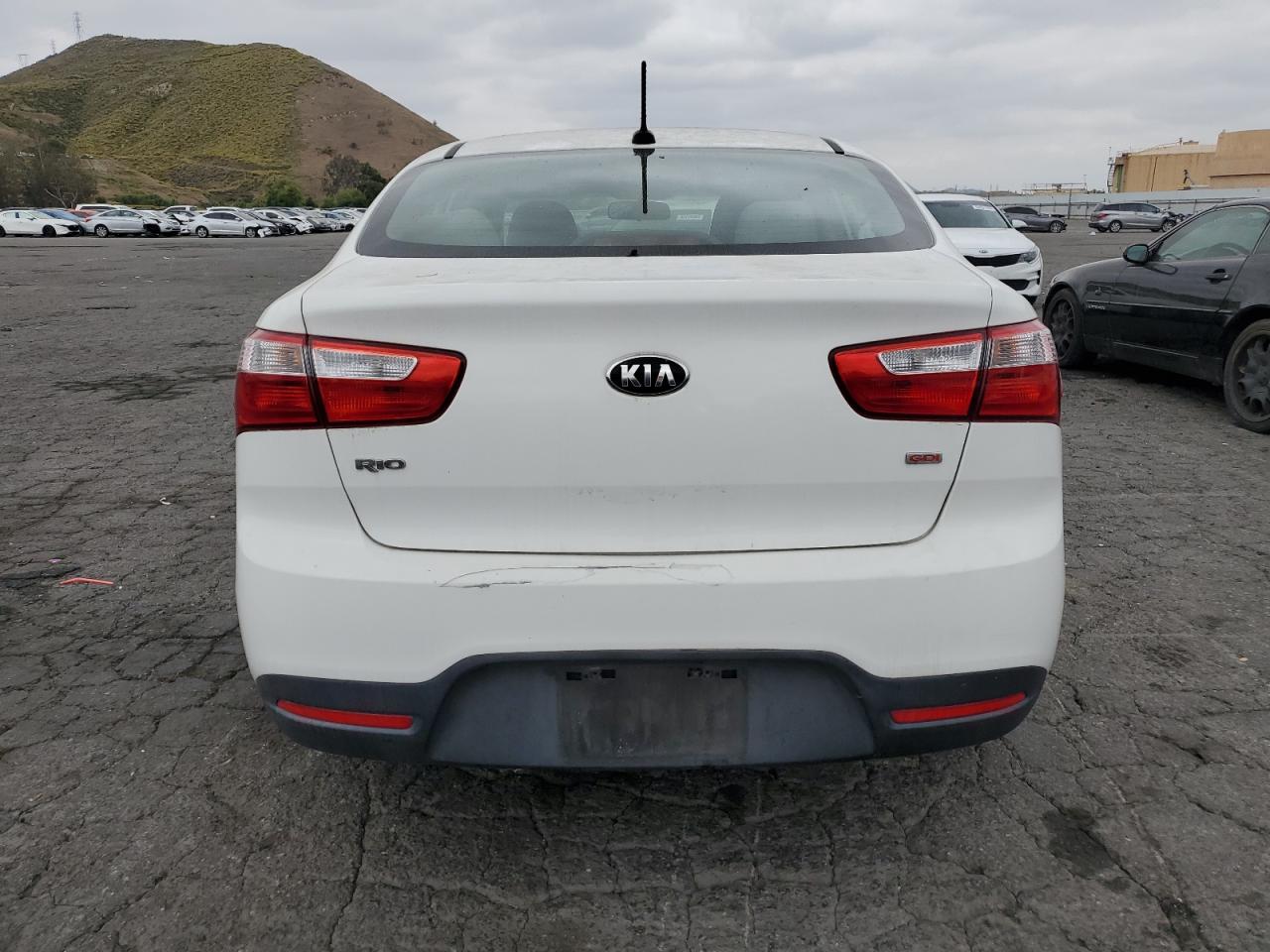 KNADM4A36E6377553 2014 Kia Rio Lx