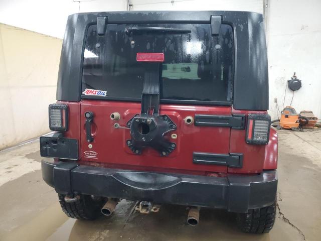 2009 Jeep Wrangler Unlimited Sahara VIN: 1J4GA59169L706142 Lot: 55913884