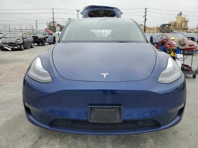 2023 Tesla Model Y VIN: 7SAYGDEF1PF647086 Lot: 55031574