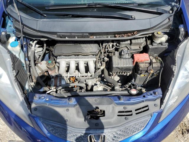 2009 Honda Fit VIN: JHMGE87289S070352 Lot: 53989744