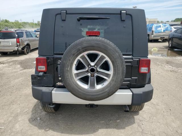 2009 Jeep Wrangler Unlimited Sahara VIN: 1J4GA59179L751686 Lot: 57171124