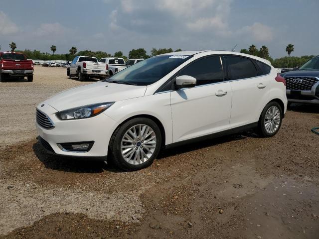 2017 Ford Focus Titanium VIN: 1FADP3N24HL272432 Lot: 57122314