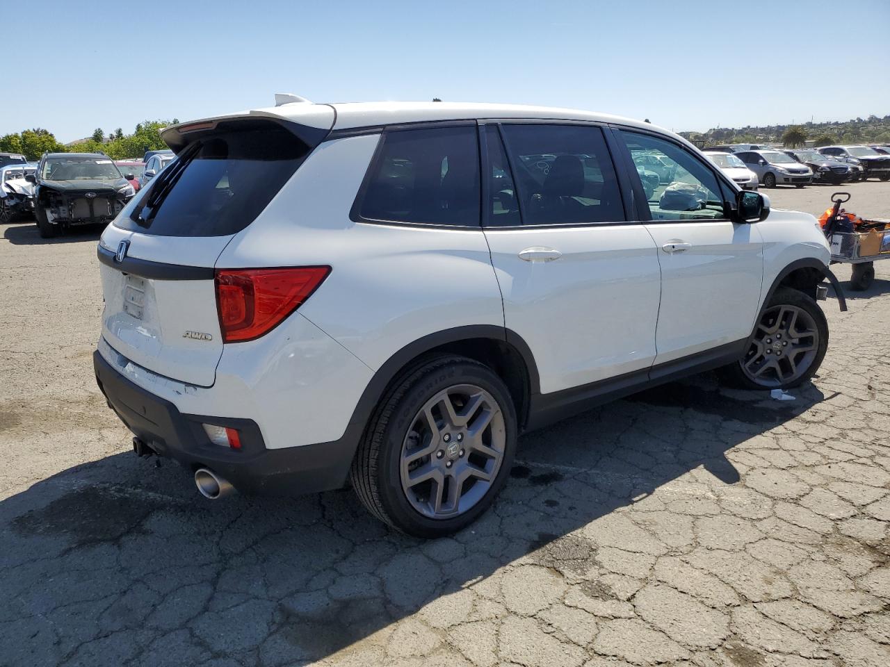 2022 Honda Passport Exl vin: 5FNYF8H52NB005628