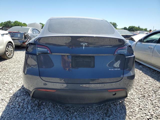 2023 Tesla Model Y VIN: 7SAYGDEE7PF610454 Lot: 56077874