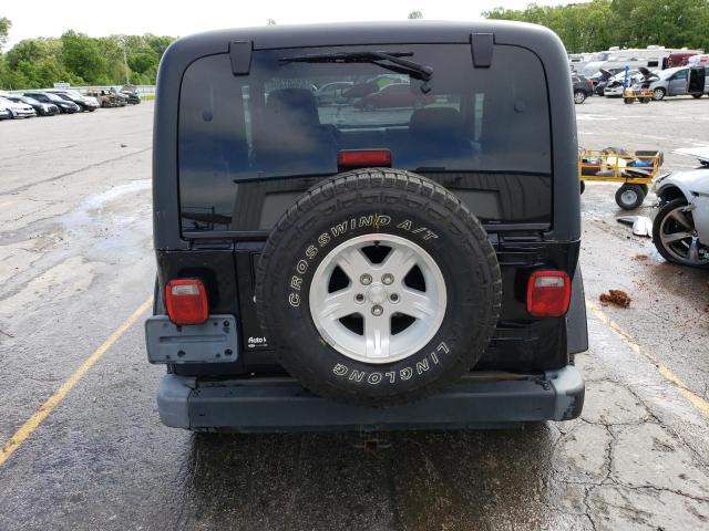 2004 Jeep Wrangler / Tj Sahara VIN: 1J4FA59S14P730855 Lot: 53607404