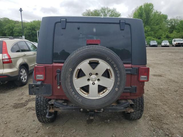 2010 Jeep Wrangler Unlimited Sahara VIN: 1J4BA5H19AL167595 Lot: 54974174