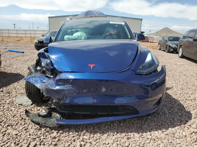 2023 Tesla Model Y VIN: 7SAYGDEEXPF927788 Lot: 55203304