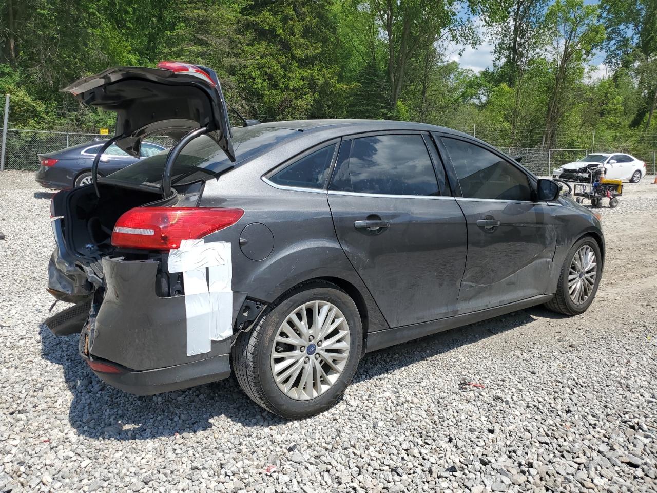 Lot #2843384686 2015 FORD FOCUS TITA