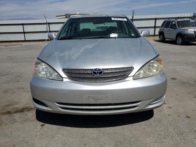 2003 Toyota Camry Le VIN: JTDBE32K230166499 Lot: 56367394