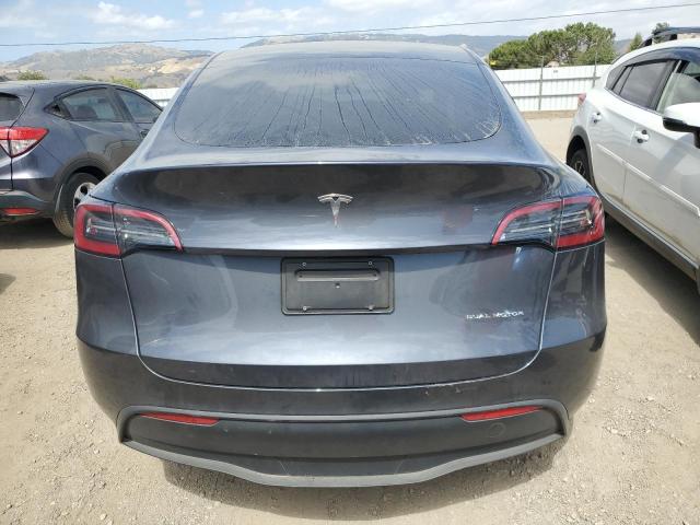 2023 Tesla Model Y VIN: 7SAYGAEE8PF637029 Lot: 56601964