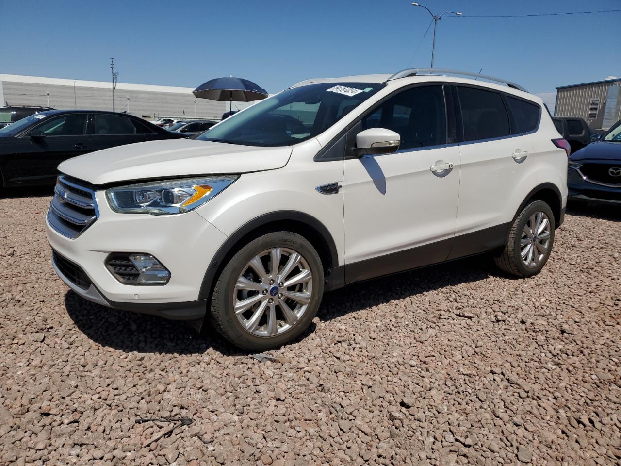 1FMCU0JD4HUC34886 2017 Ford Escape Titanium