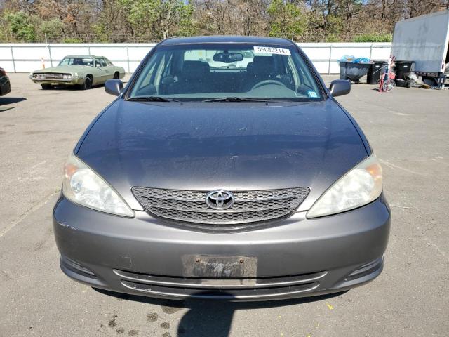 2002 Toyota Camry Le VIN: JTDBF30K220022921 Lot: 56080214