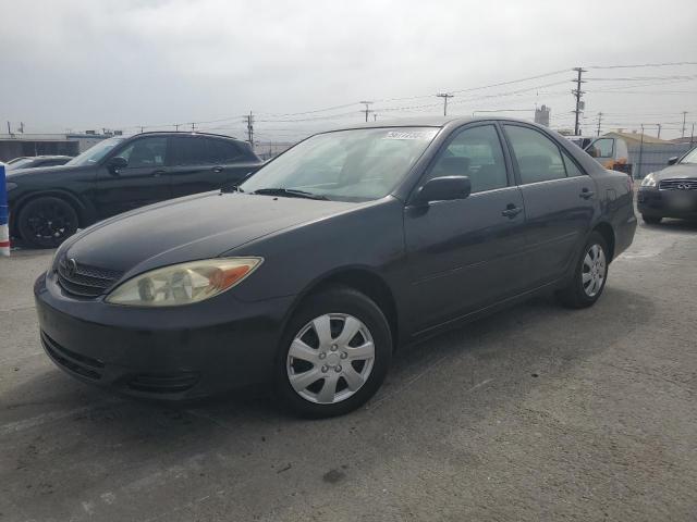 2002 Toyota Camry Le VIN: JTDBE32K320019347 Lot: 56772384